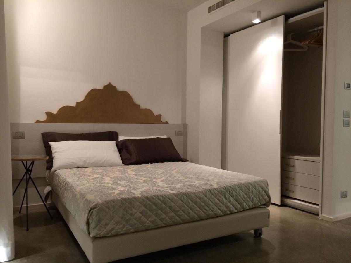 Residenza Domo Apartment ปอร์โต ซันเตลปีดิโอ ห้อง รูปภาพ